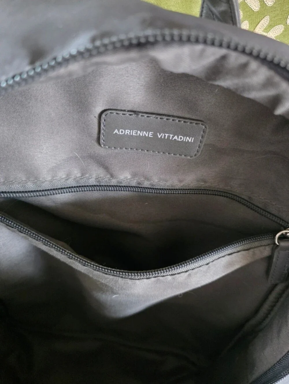 Quilted, Sleek, boxy, Gray Nylon Backpack with Pink-Tan Stripe.